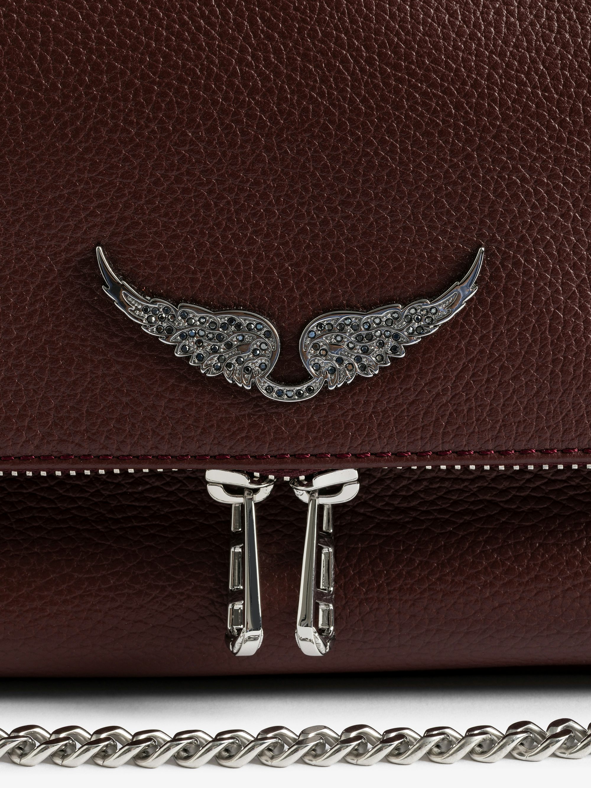 Rocky II Bag - Grained leather shoulder bag with chain and signature wings.